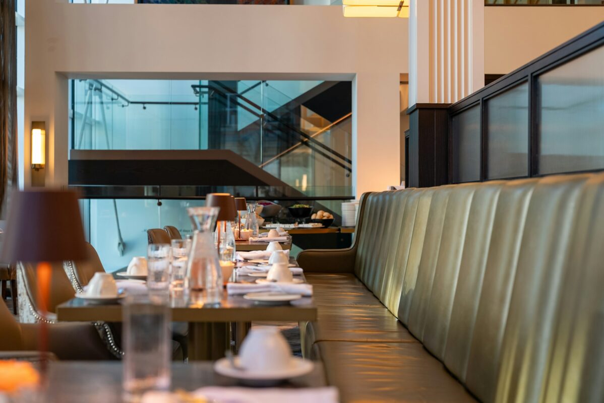 Elegant restaurant dining area with booth seating