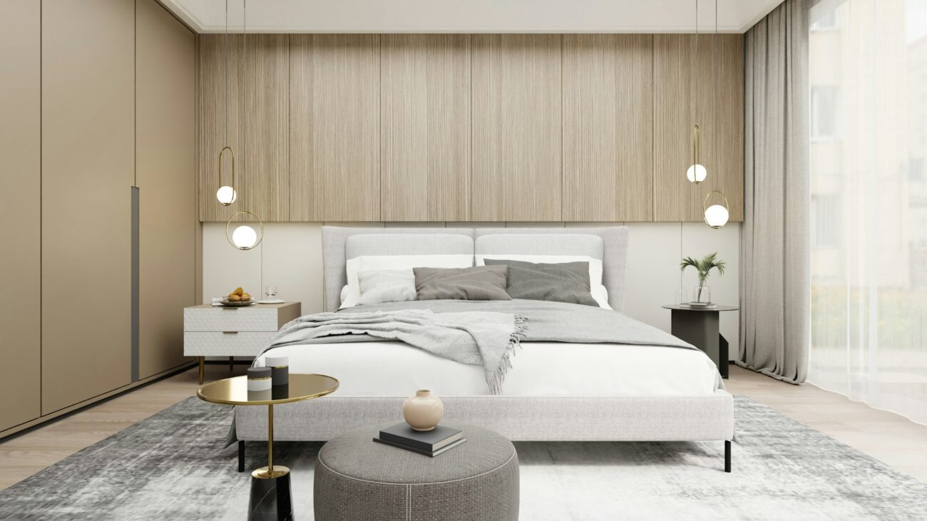 A bedroom with a large bed and a large window