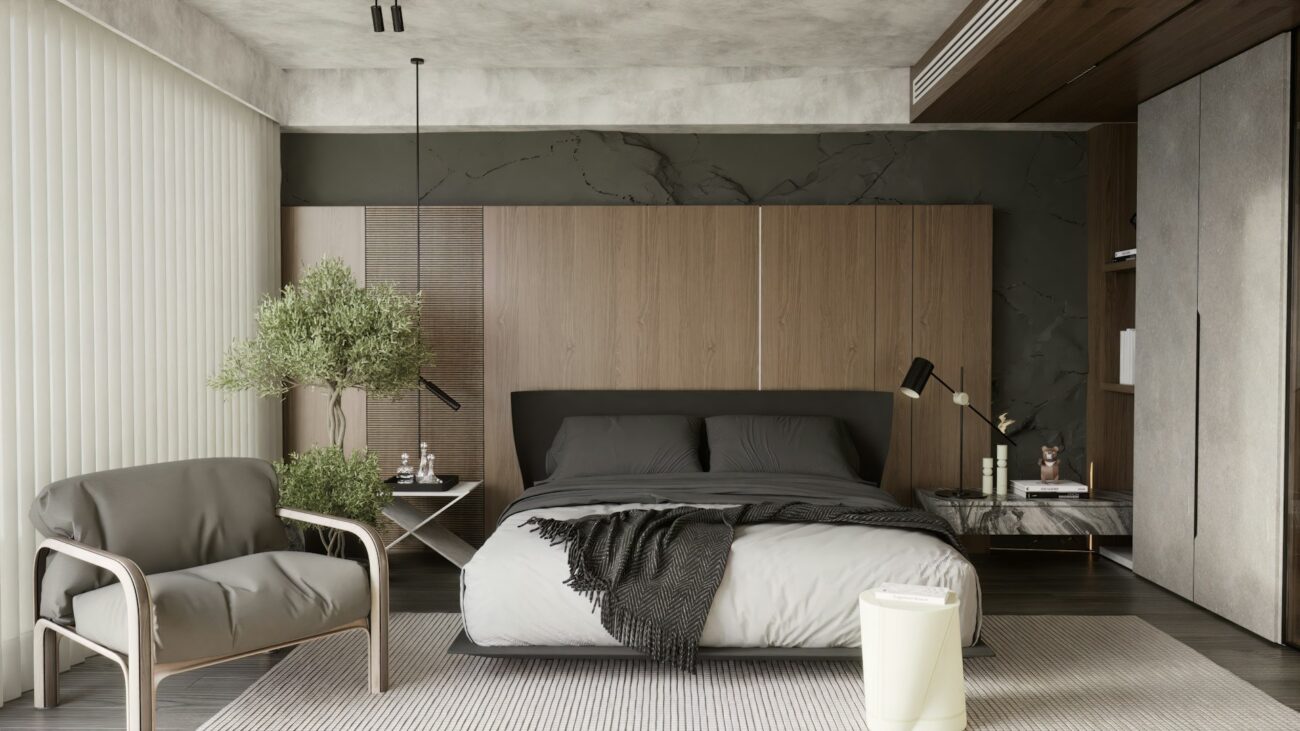 A bedroom with a bed and a chair